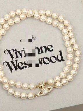 Vivienne Westwood Ivory Pearl Double Strand Necklace with Gold Orb Clasp
